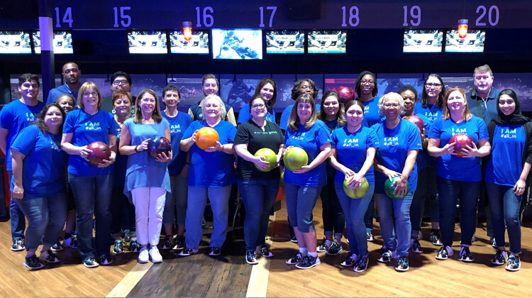 Texas Payment Center Goes Bowling