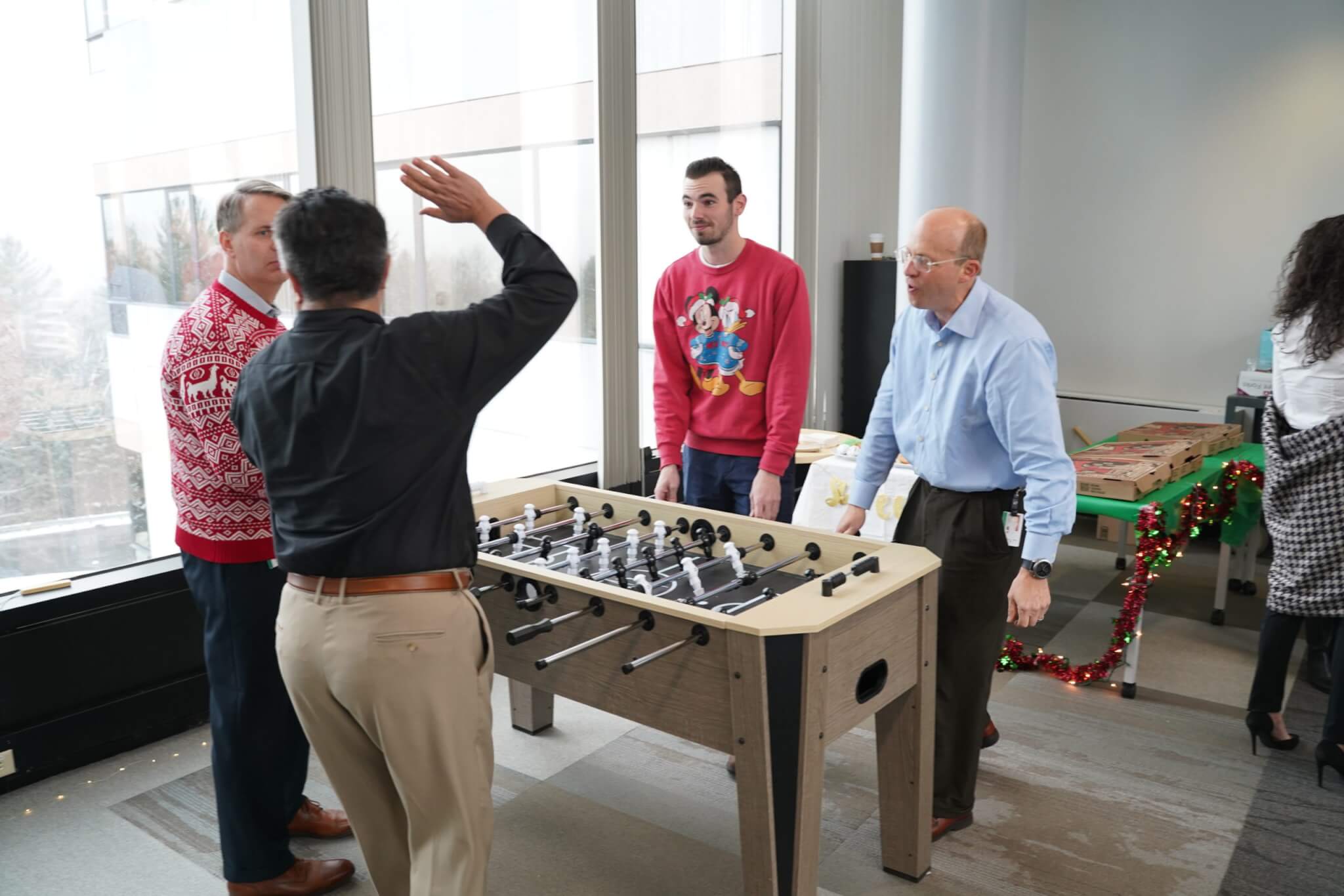 Ugly Sweaters and Sweet Foosball Moves: L&A Celebrates with ESI